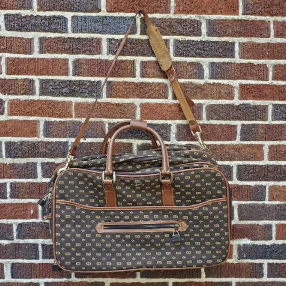 Vintage 80s Lark expandable carry on suitcase messenger bag